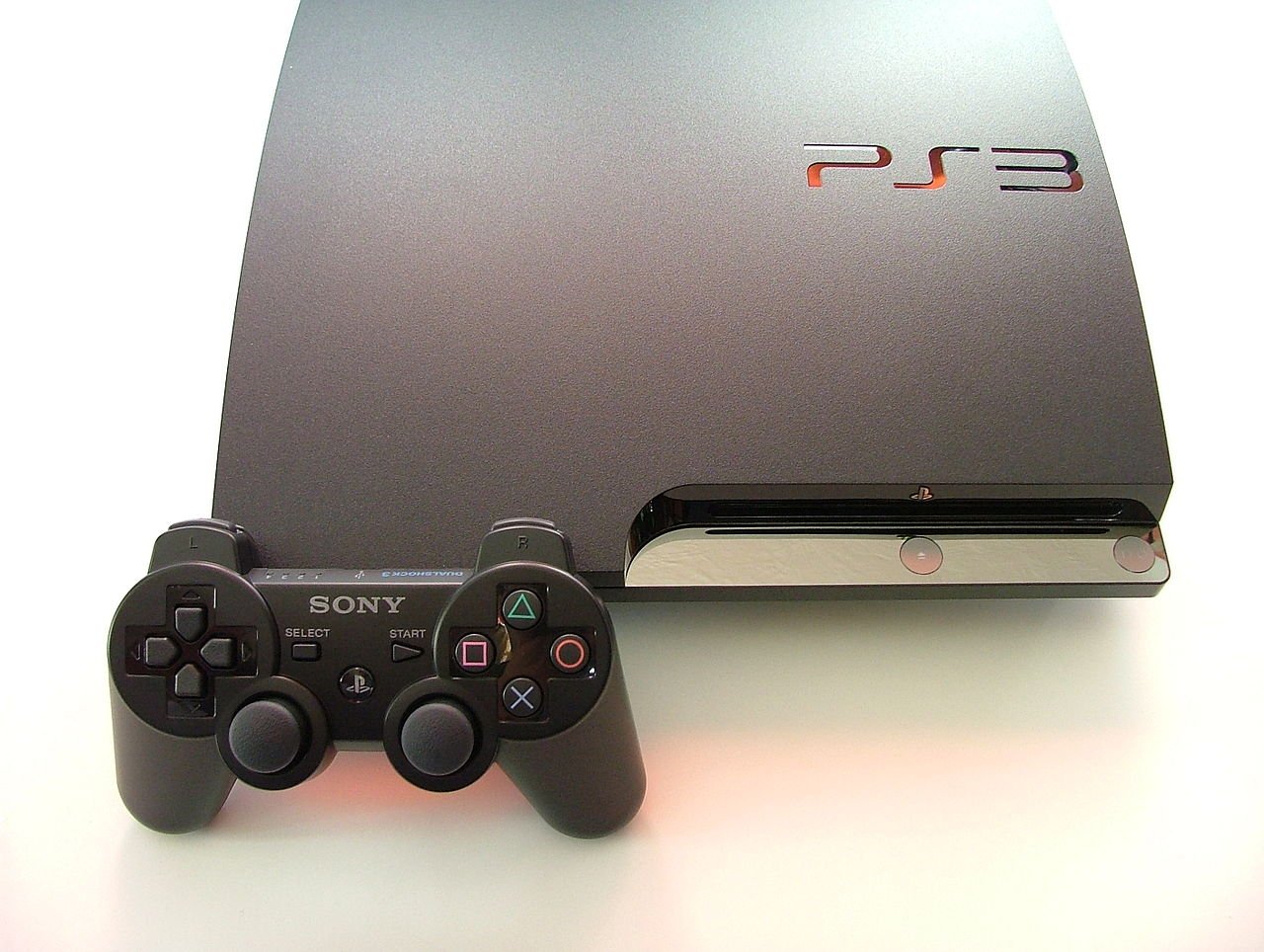 Ps3.jpg PS3 Slim Quasi Neuf + 2 Manette & 20 Jeux installé – Image 1